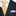 Yellow tie with purple dots worn with a black suit and white shirt.