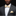 Man wearing a gray suit with a yellow bow tie and pocket square on a black background