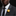 yellow flower brooch on man with grey suit
