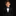 Young boy in a black suit and bow tie against a black background
