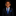 Young boy in a suit with a blue tie and pocket square on a black background
