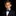 child wearing blue with white and light blue dots bow tie and square on suit
