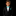 Young boy in a black suit with a turquoise bow tie on a black background