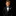 Young boy in a formal black suit with a bow tie and pink handkerchief on a black background
