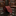 A rolled burgundy necktie with a textured herringbone pattern, displayed on a clean white background.