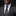 Man wearing a gray suit with a patterned tie and pocket square on a black background