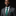 Man wearing a gray suit with a green tie and green pocket square on a black background