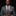 Man wearing grey floral tie and pink square