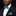 Man wearing light blue and grey check bow tie and square