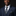 Man wearing a navy suit with a polka dot tie and pocket square against a black background