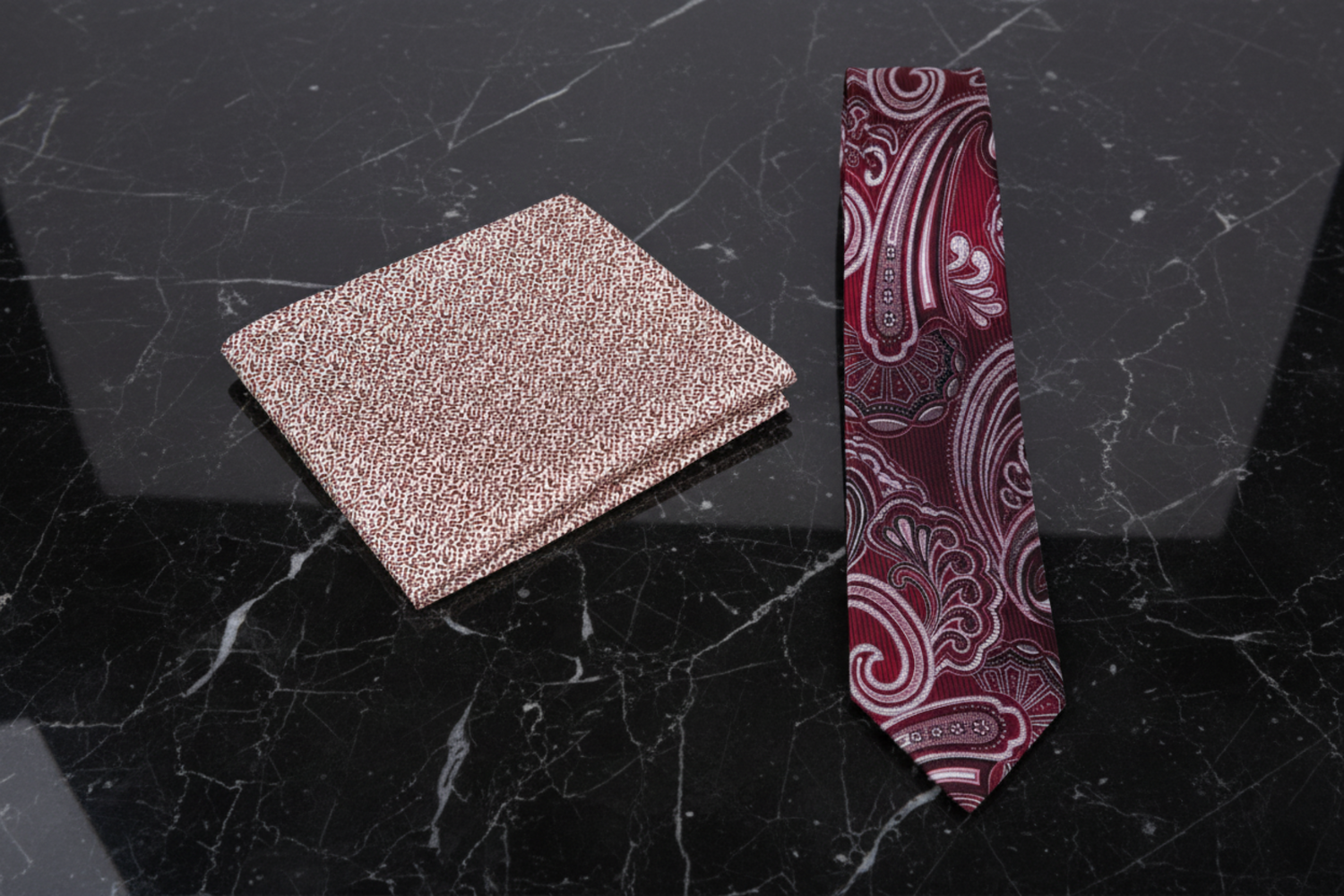 Red paisley thin tie and accenting pocket square