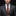 Man wearing a gray suit with an orange and black tie against a black background