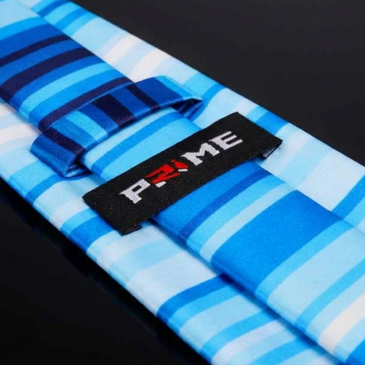  Shades of Blue and Red Gradient Tie Logo