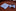Blue patterned bow tie and pocket square set on a mahogany background