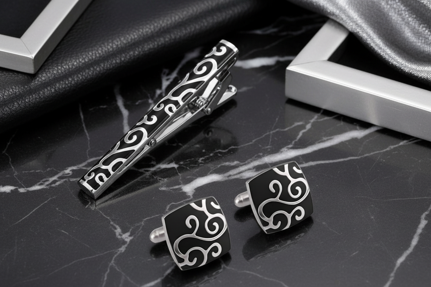 chrome and black tie bar and cufflinks