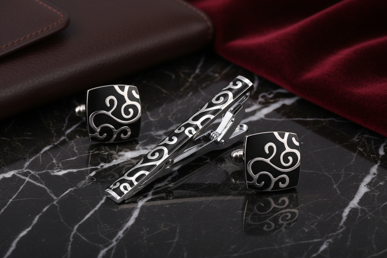 chrome and black tie clip and cufflinks