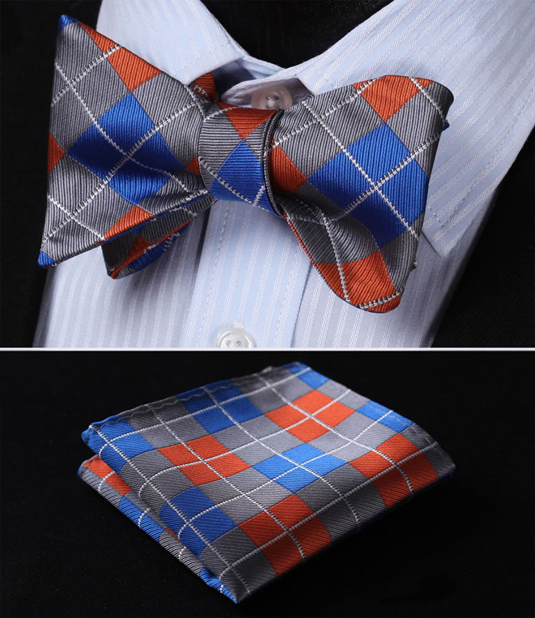 A Grey, Orange, Blue Geometric Argyle Pattern Silk Self Tie Bow Tie, Matching Pocket Square and Cuff-links.||Grey, Blue, Orange