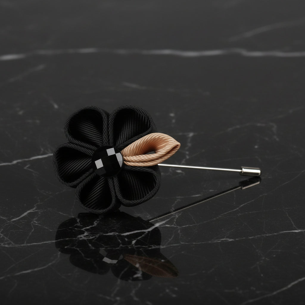 A Black, Gold Colored Thick Petal Lapel Flower||Black, Tan