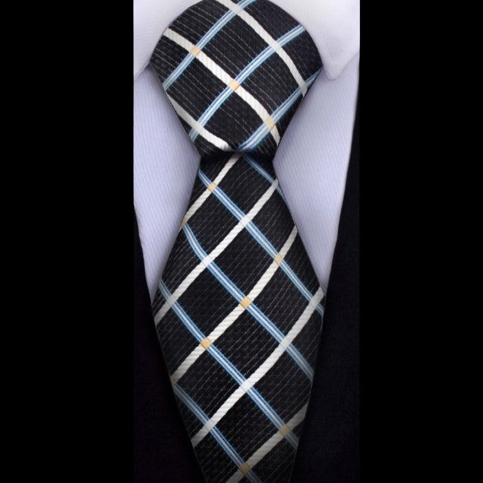 A Black, Cream And Blue With Geometric Diamond Pattern And Small Checks Pattern Necktie