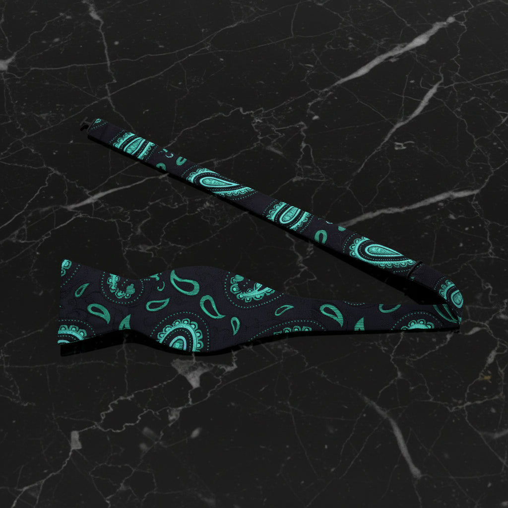 A Green, Black Paisley Pattern Self Tie Bow Tie Untied