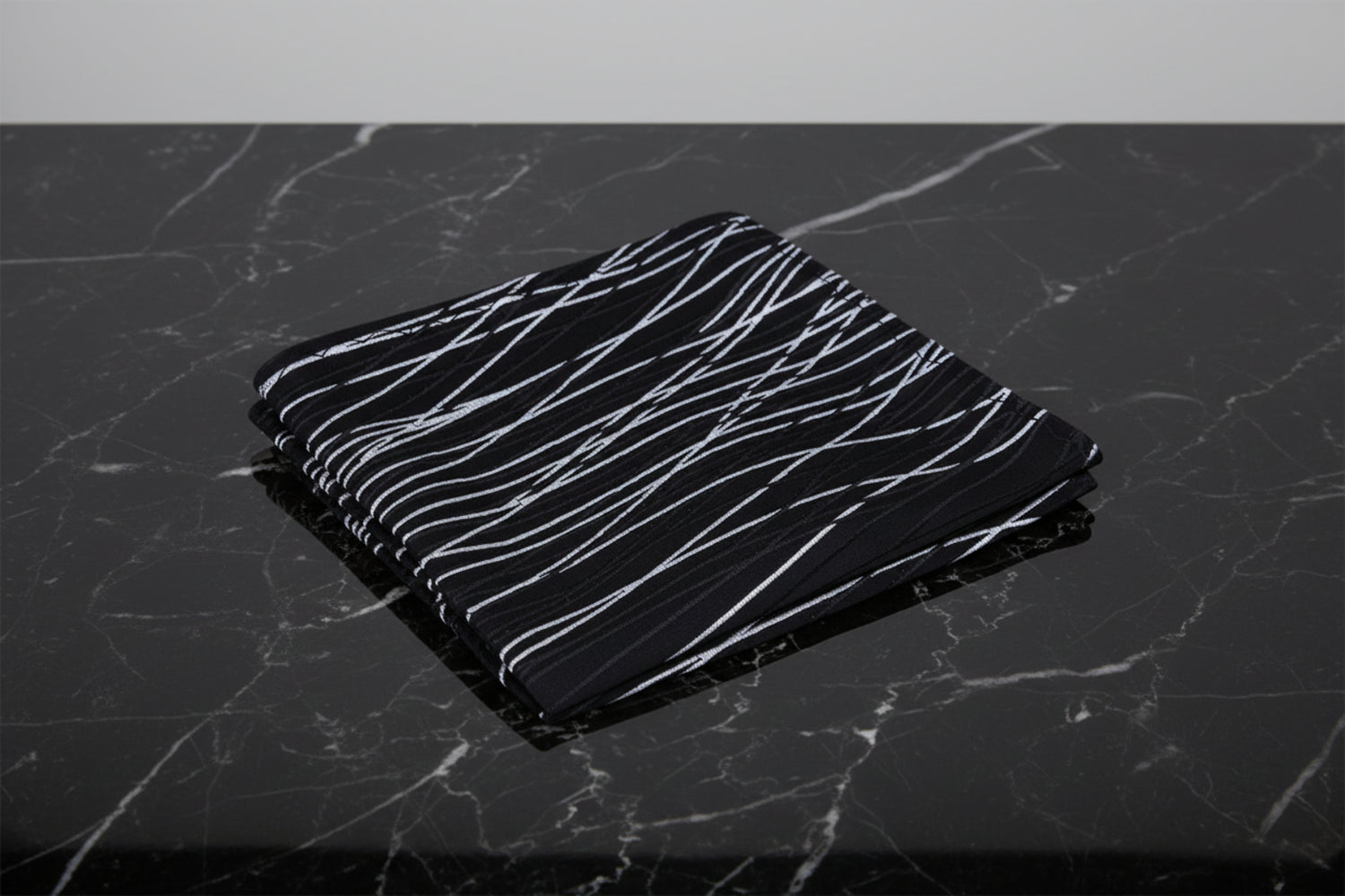 A Black, White Abstract Lines Pattern Pocket Square