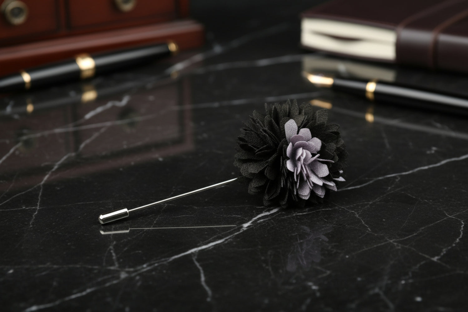 black and grey lapel pin