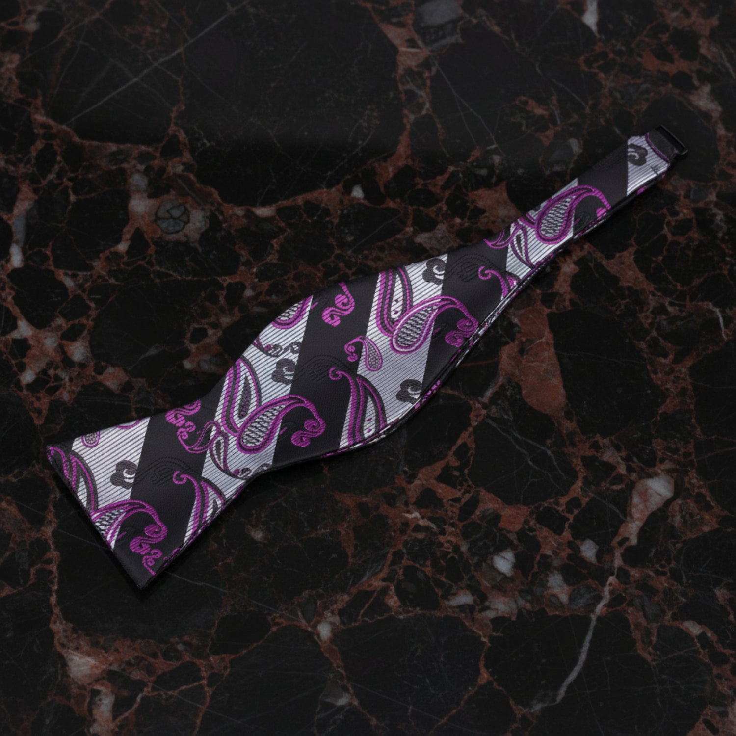 A Black, Grey, Purple Paisley Pattern Self Tie Bow Tie Untied