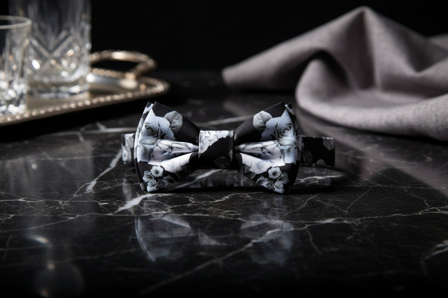 A Black Background with Grey Roses and Dark Grey Petals Bow Tie