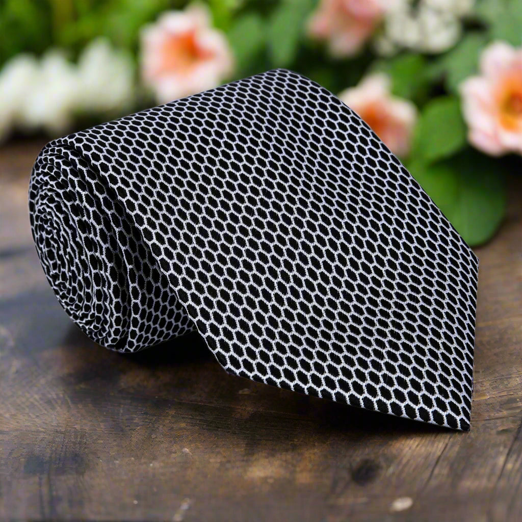 A Dark Graphite, White Geometric Oval Shaped Pattern Necktie 