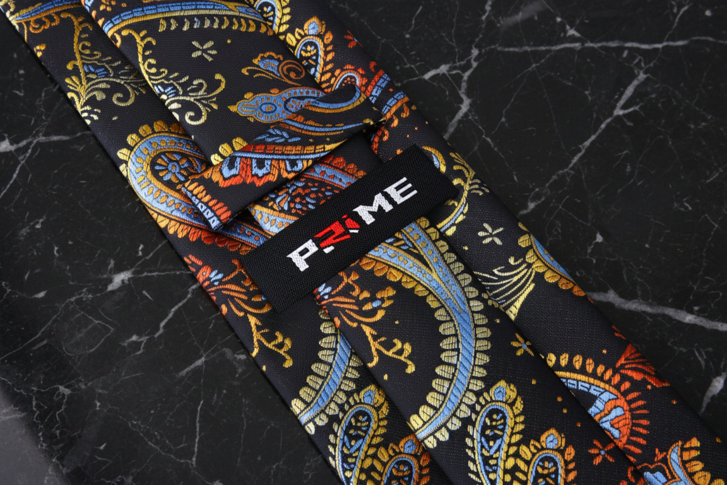Black, Red, Orange, Yellow and Light Blue Paisley Tie Keep
