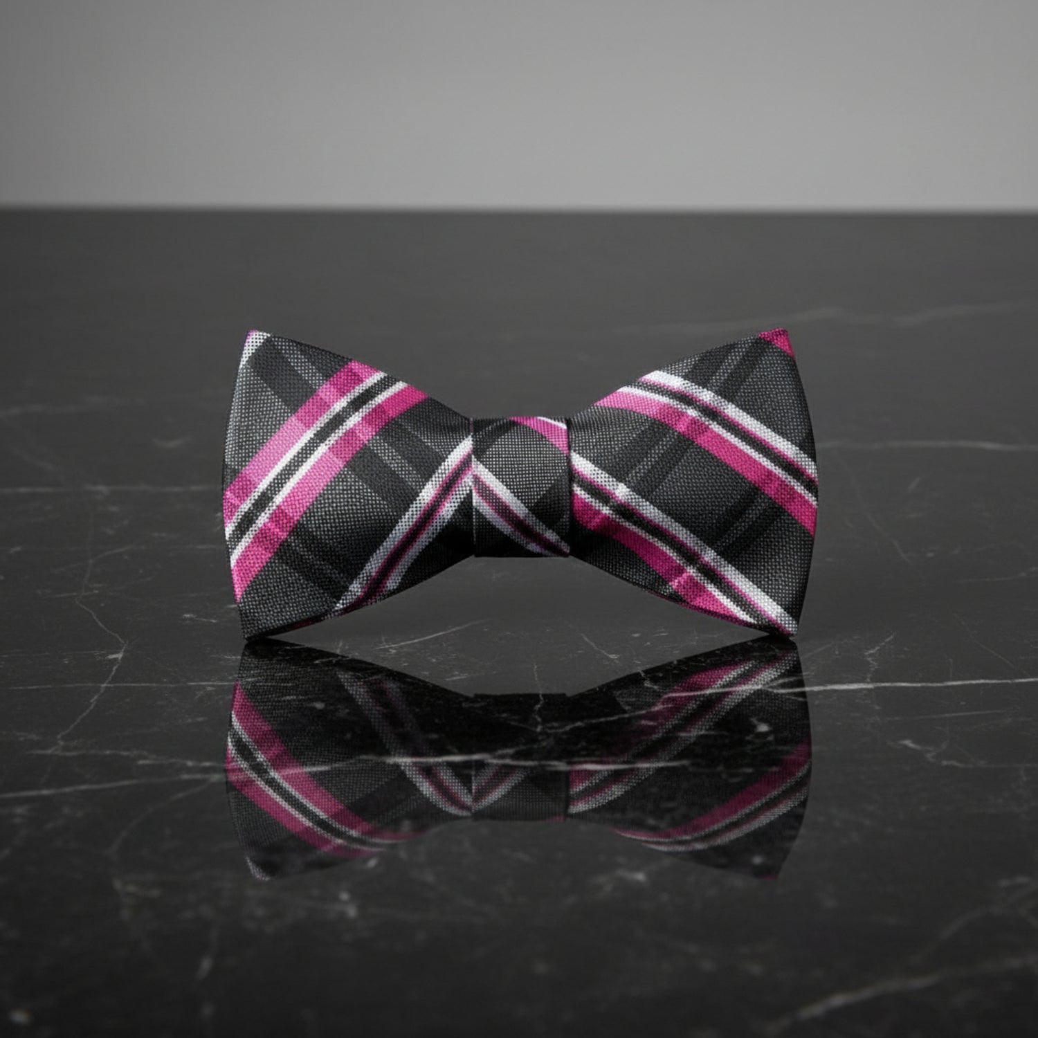A Black, Pink Plaid Pattern Self Tie Bow Tie 