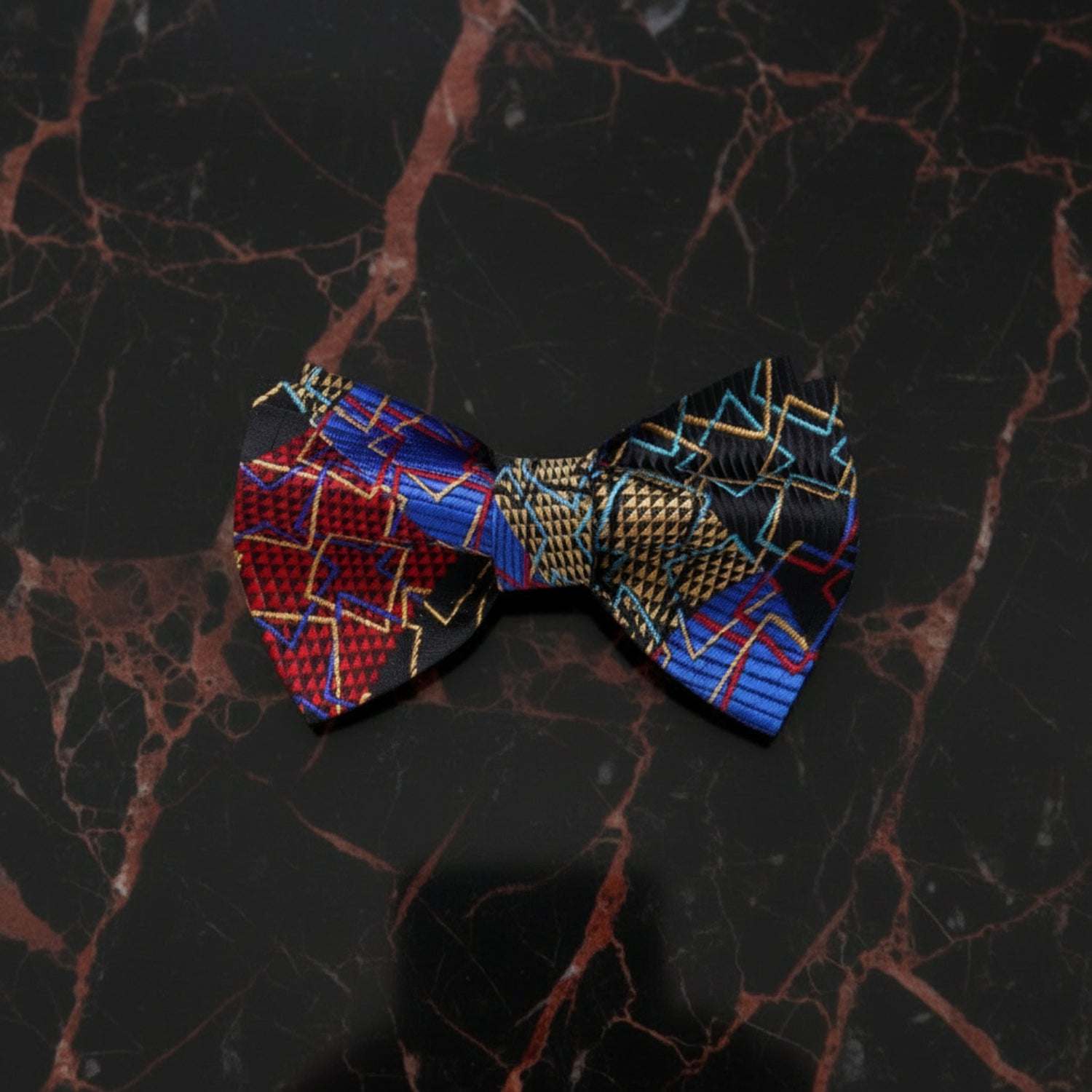 A Black, Gold and Red Geometric Bow Tie