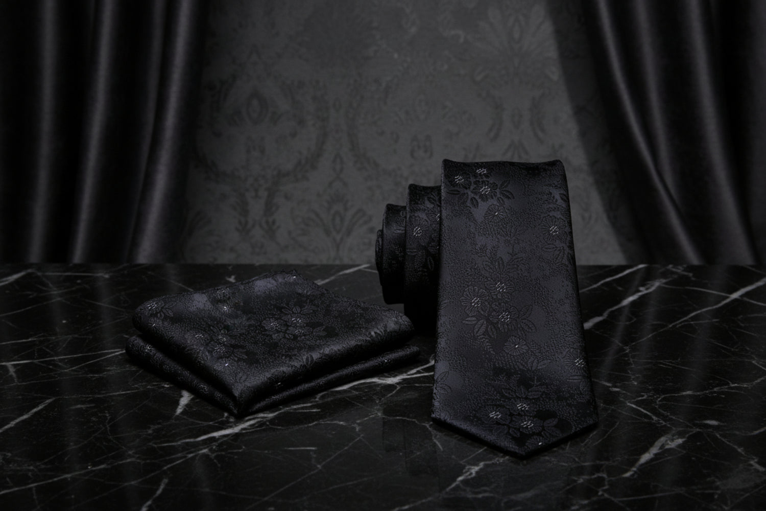 Alt View: A Black With White Floral Pattern Necktie With Matching Pocket Square