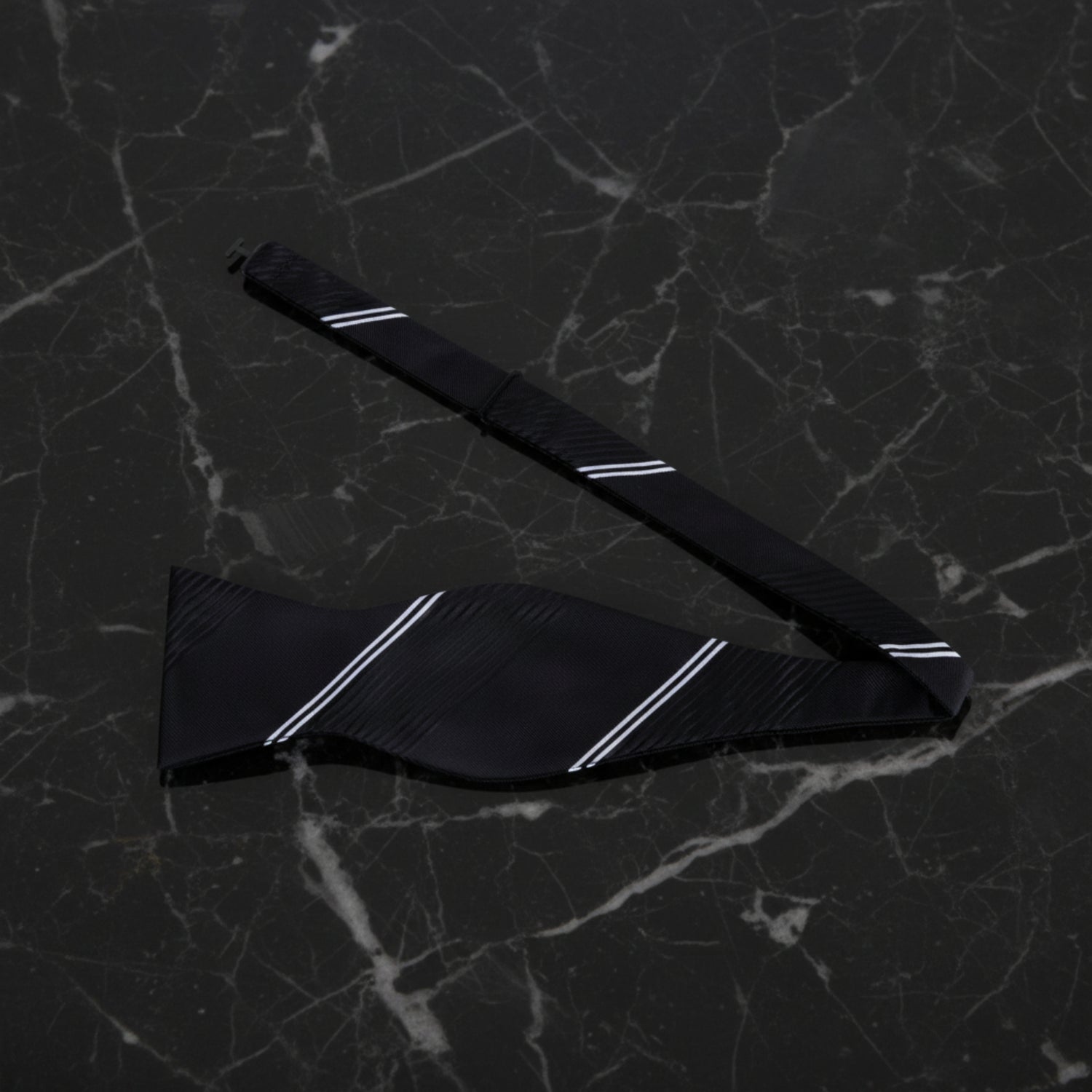 Untied View: A Black, White Vertical Lined Pattern Self Tie 