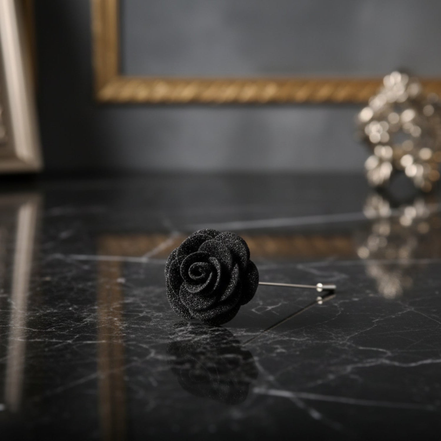 A Shimmery Frosted Black Colored Lapel Flower
