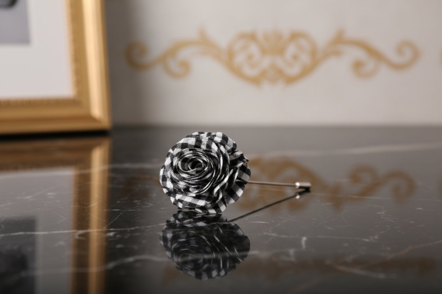 A Black, Grey Plaid Colored Leafy Petal Flower Shaped Lapel Pin||Black, White