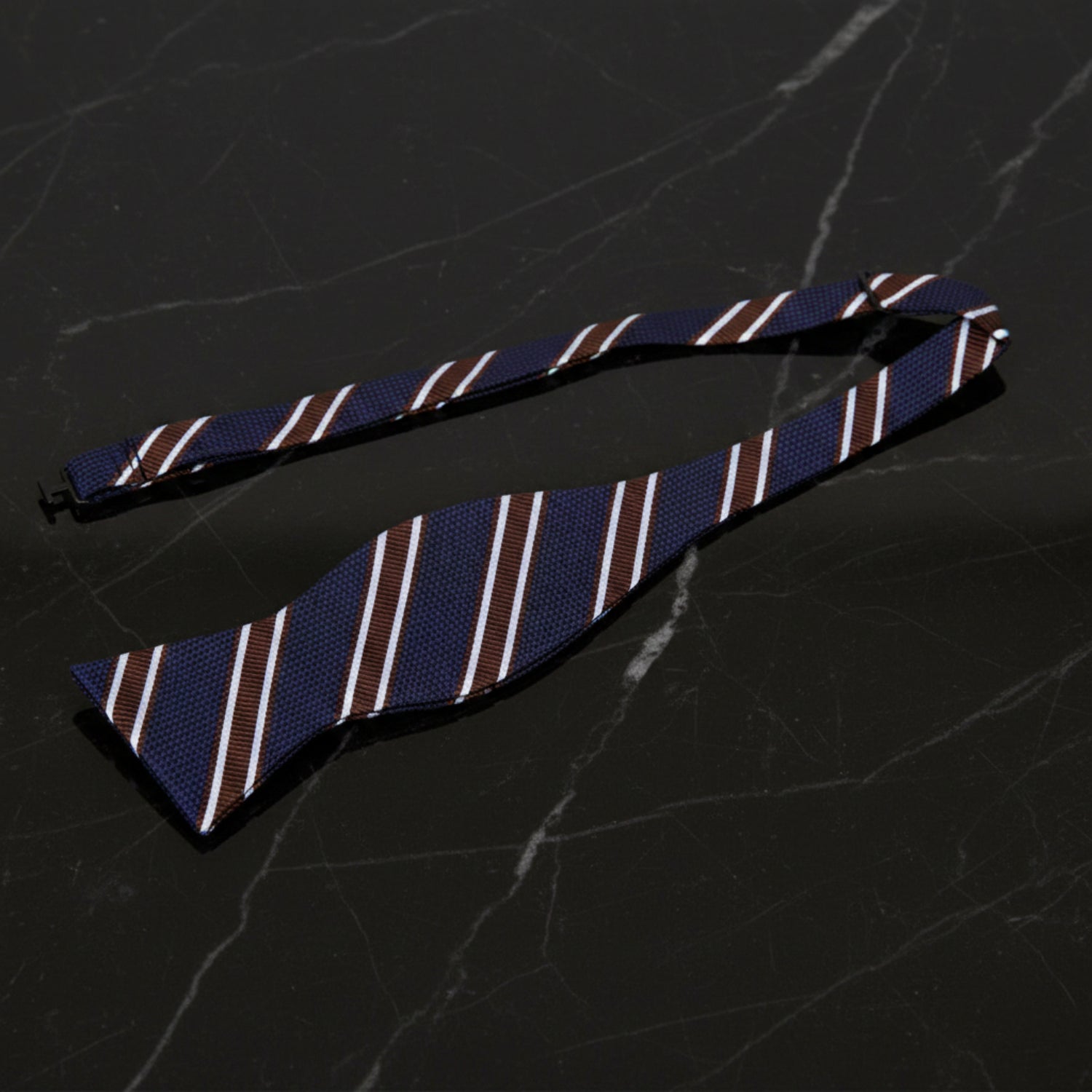 Untied View: A Dark Blue, Brown, White Stripe Pattern Self Tie Bow Tie