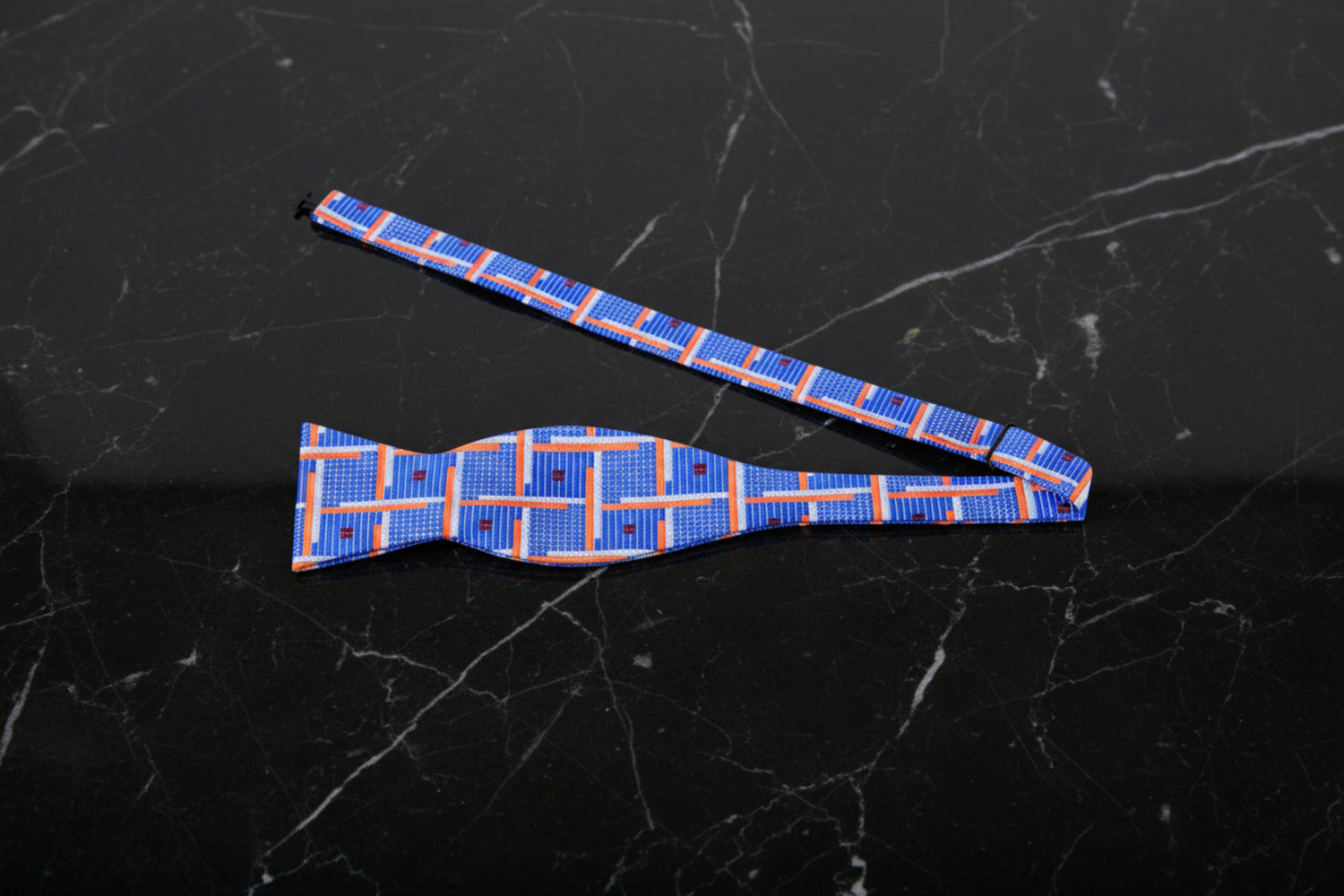 Untied View: A Blue, Orange, White Geometric Squares Pattern Self Tie Bow Tie