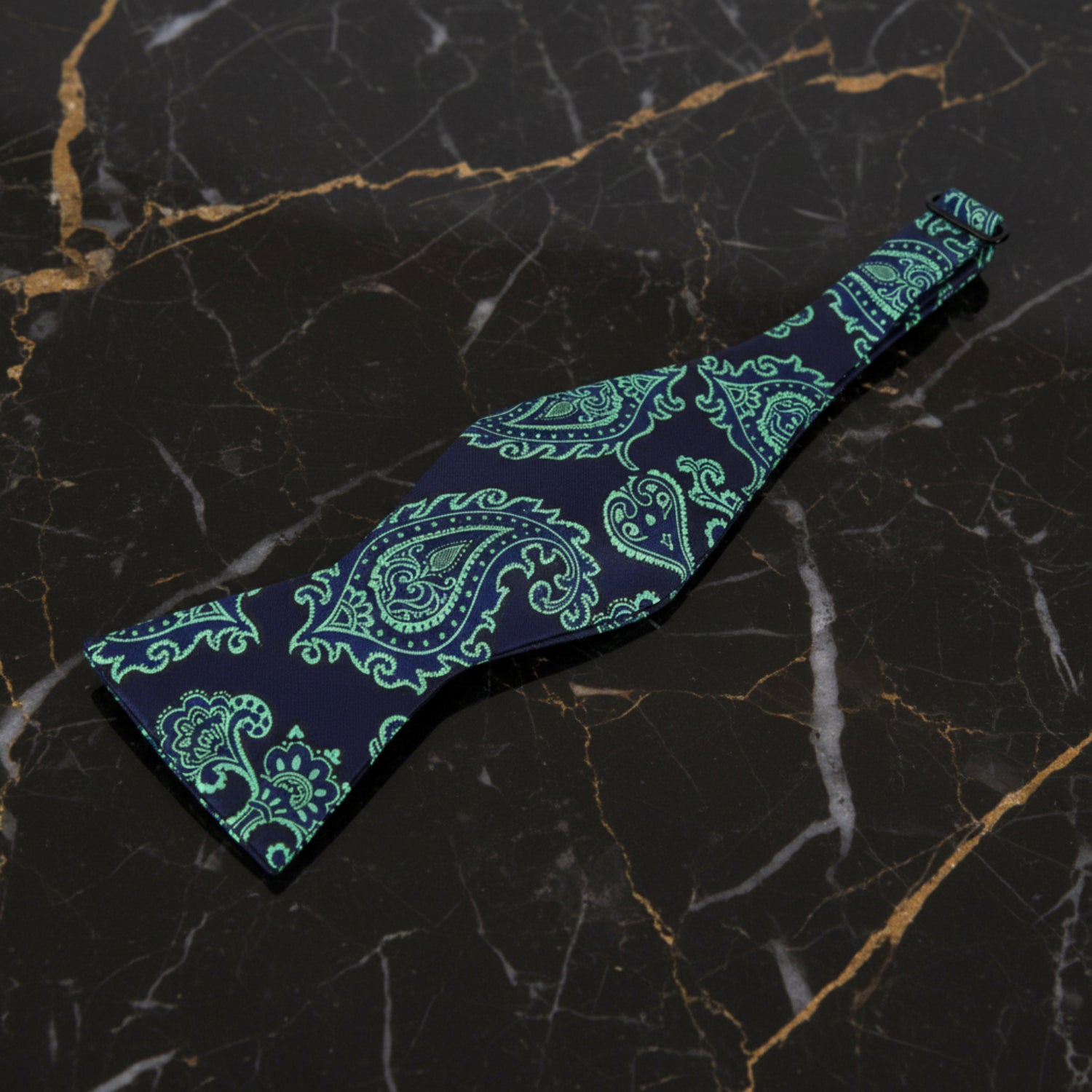 A Dark Blue, Green Detailed Paisley Pattern Self Tie Bow Tie  Untied
