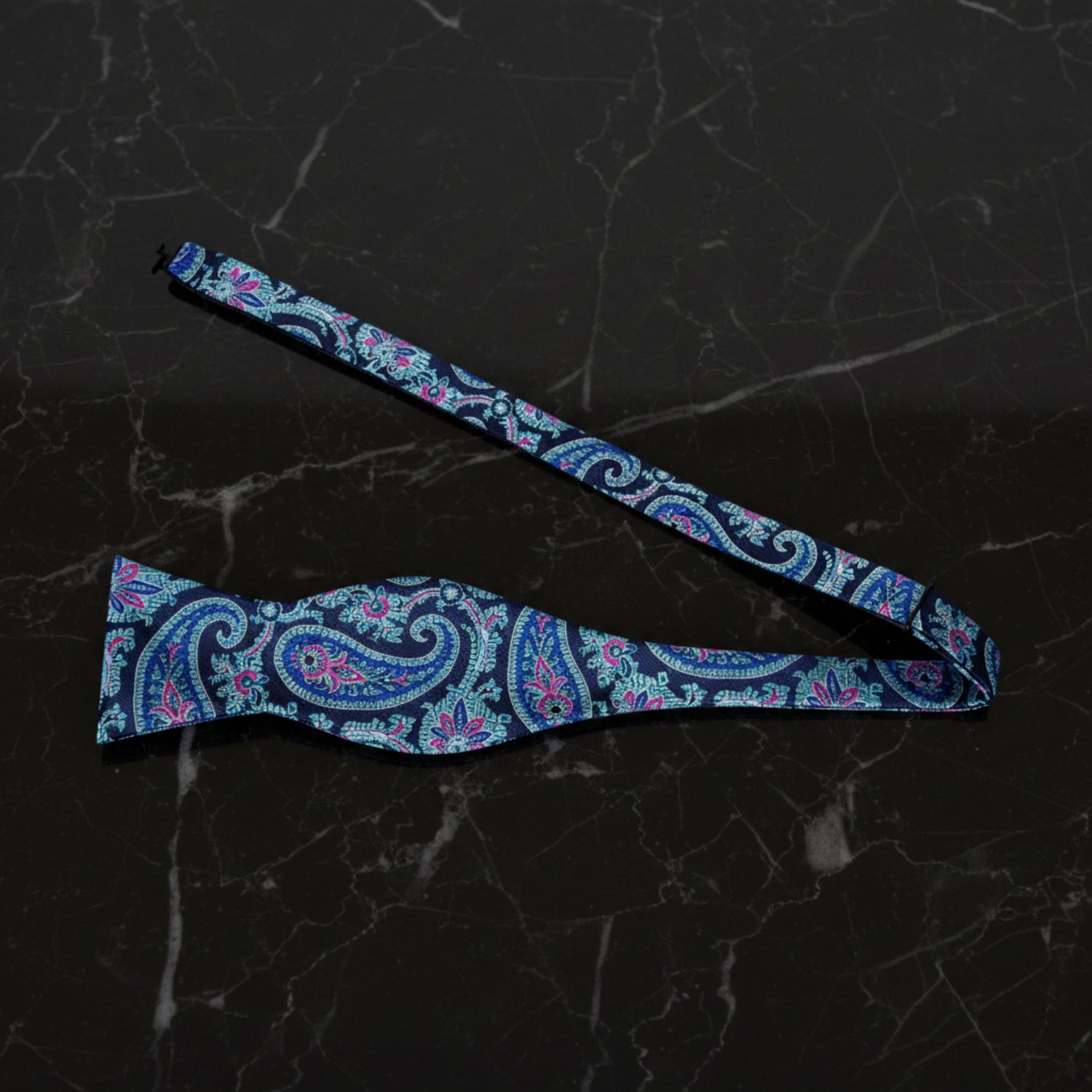 A Green, Blue Floral Pattern Self Tie Bow Tie Untied