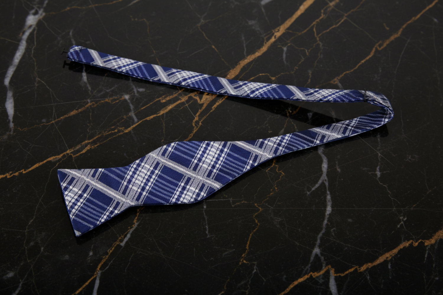 A Blue, Grey Plaid Pattern Self Tie Bow Tie Untied