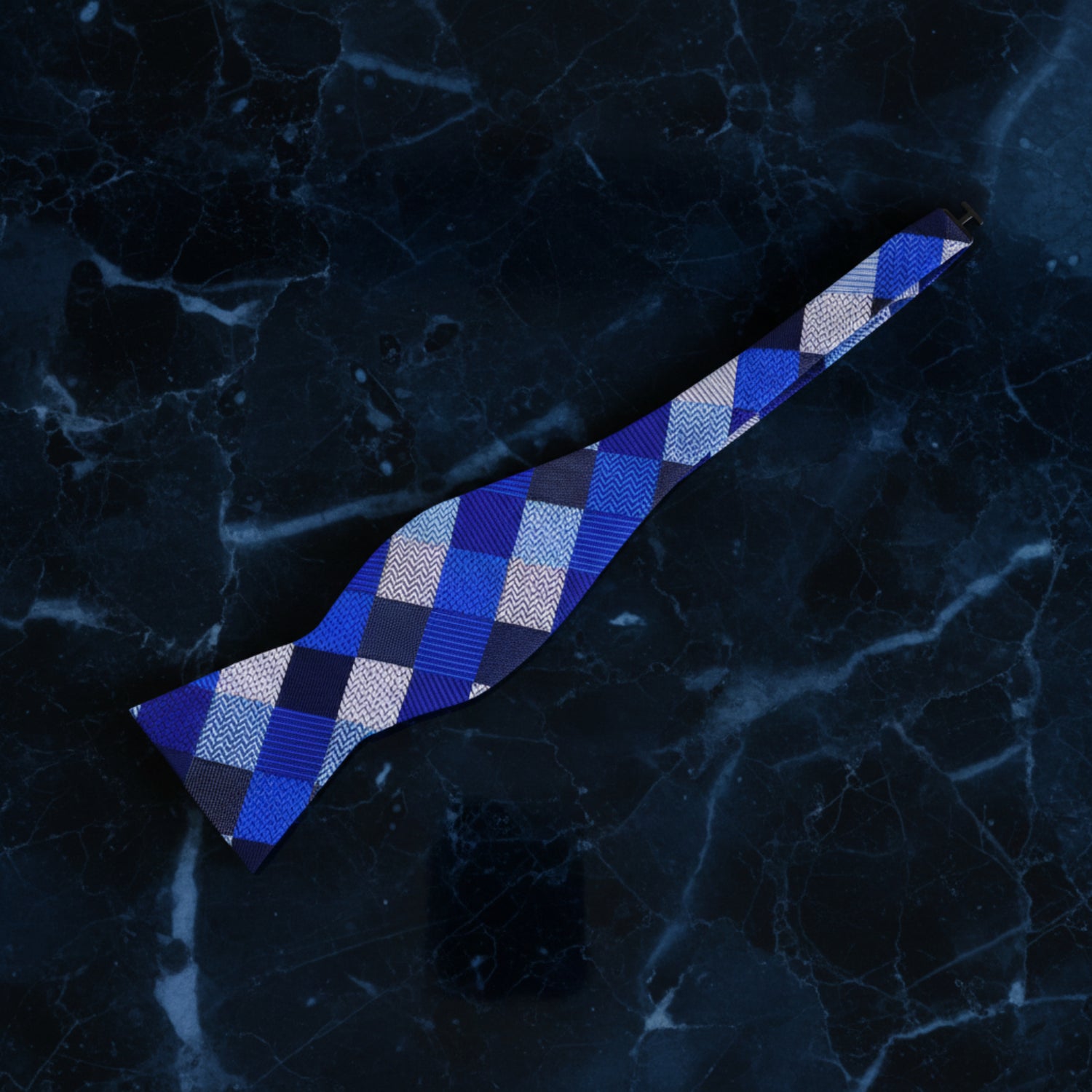 A Blue, Light Blue Checker Pattern Self Tie Bow Tie Untied