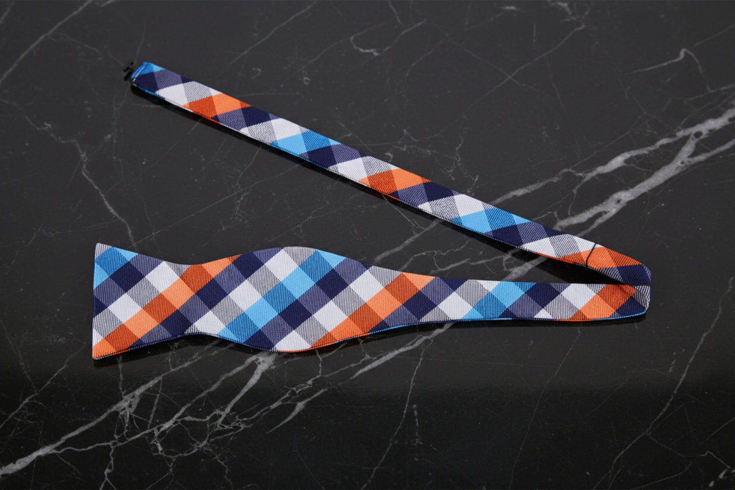 Untied: A Orange, White, Blue Geometric Check Pattern Self Tie Bow Tie 