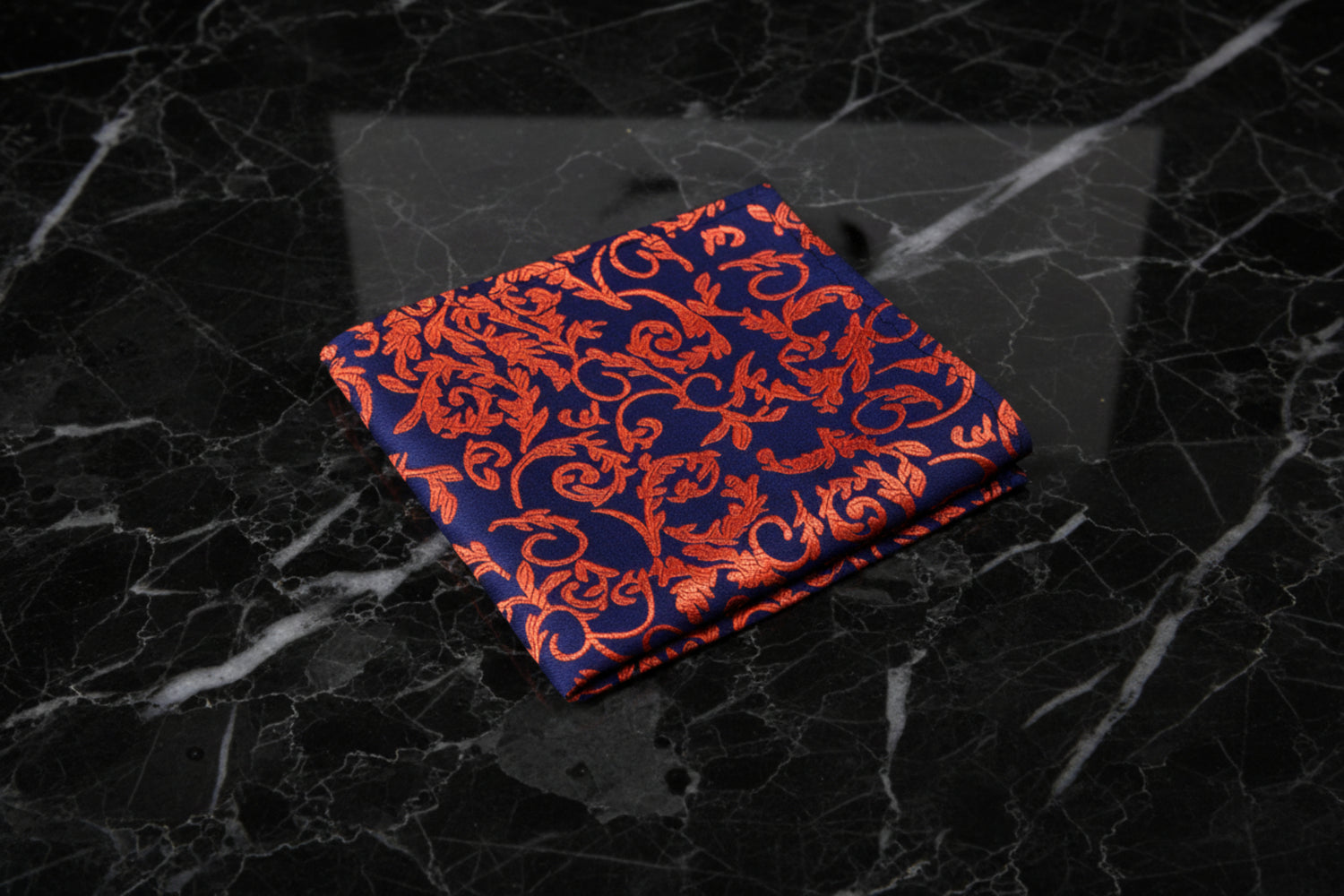 A Blue, Orange Intricate Floral Pattern Pocket Square