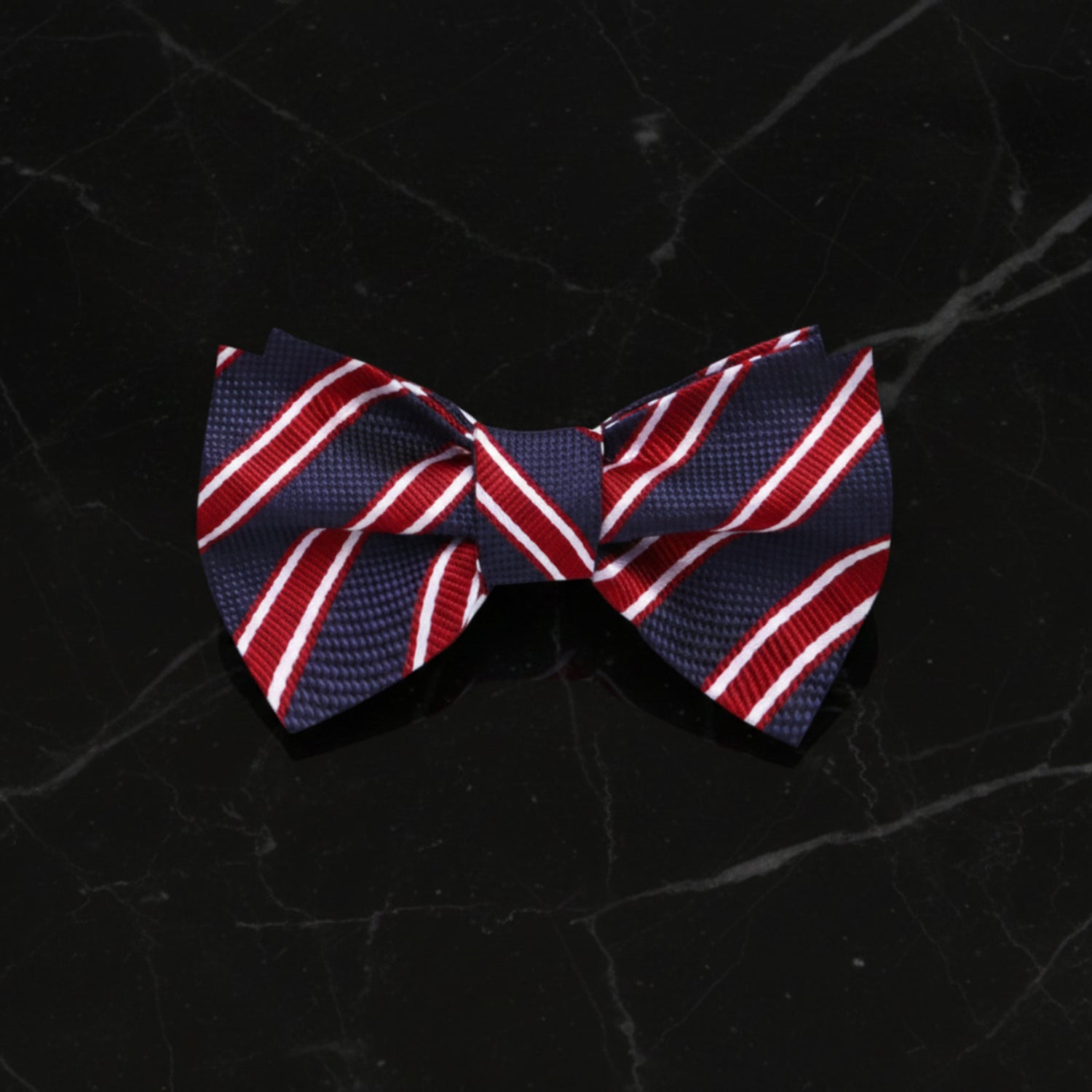 A Dark Blue, Red, White Stripe Pattern Self Tie Bow Tie 