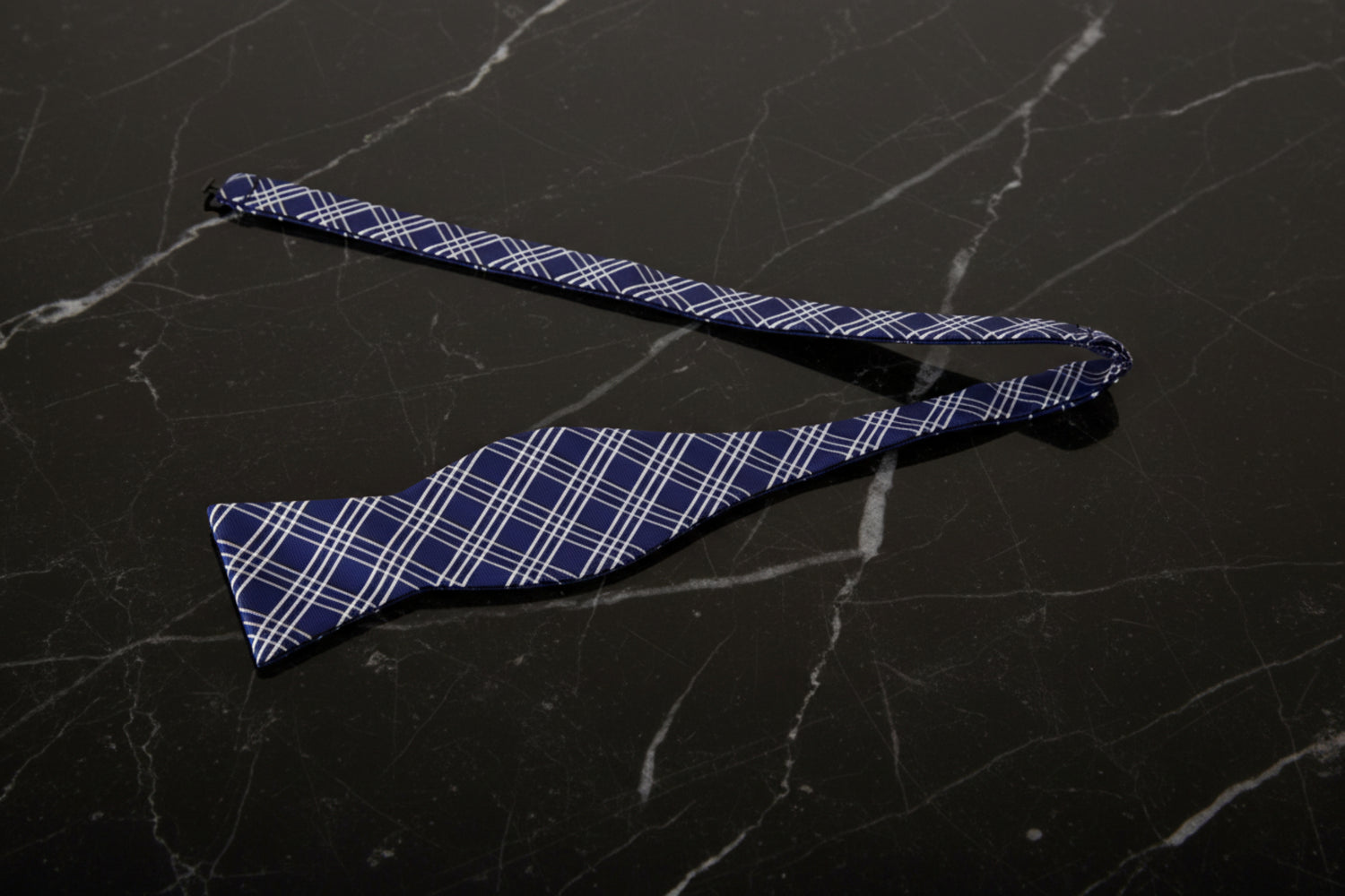 Untied: A Blue, White Geometric Plaid Pattern Self Tie Bow Tie 