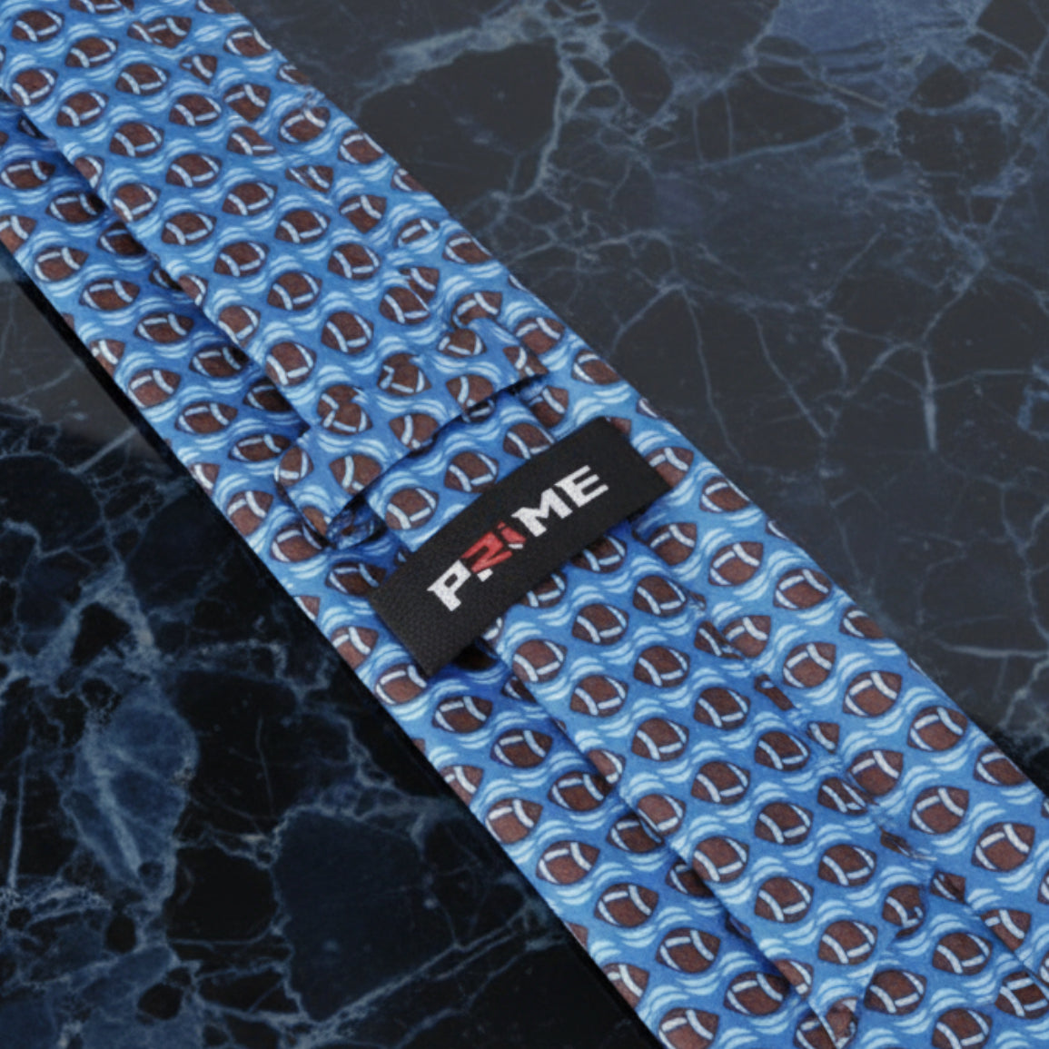 Blue, Brown Footballs Tie Keep