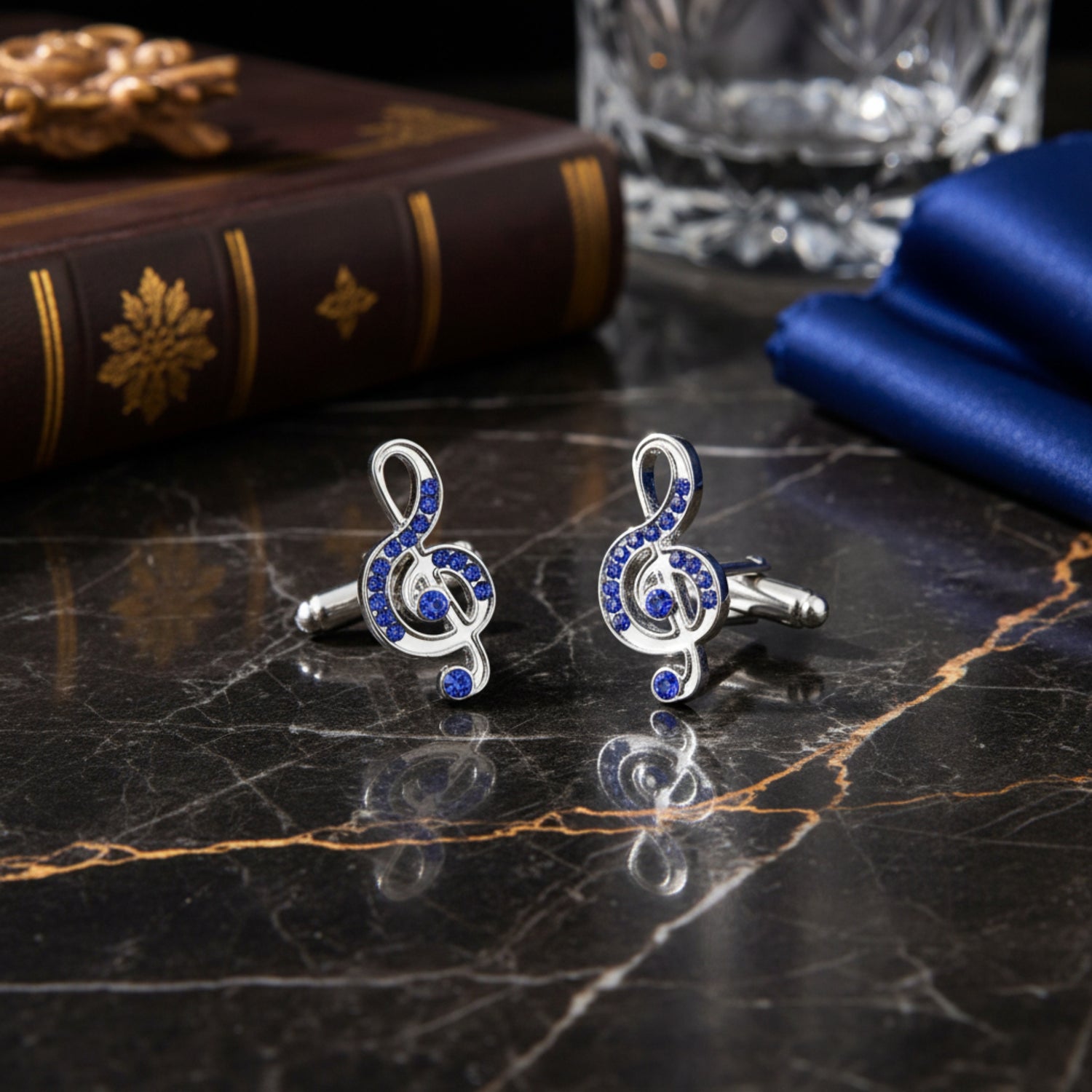 A Chrome and Blue Music Note Cuff-links