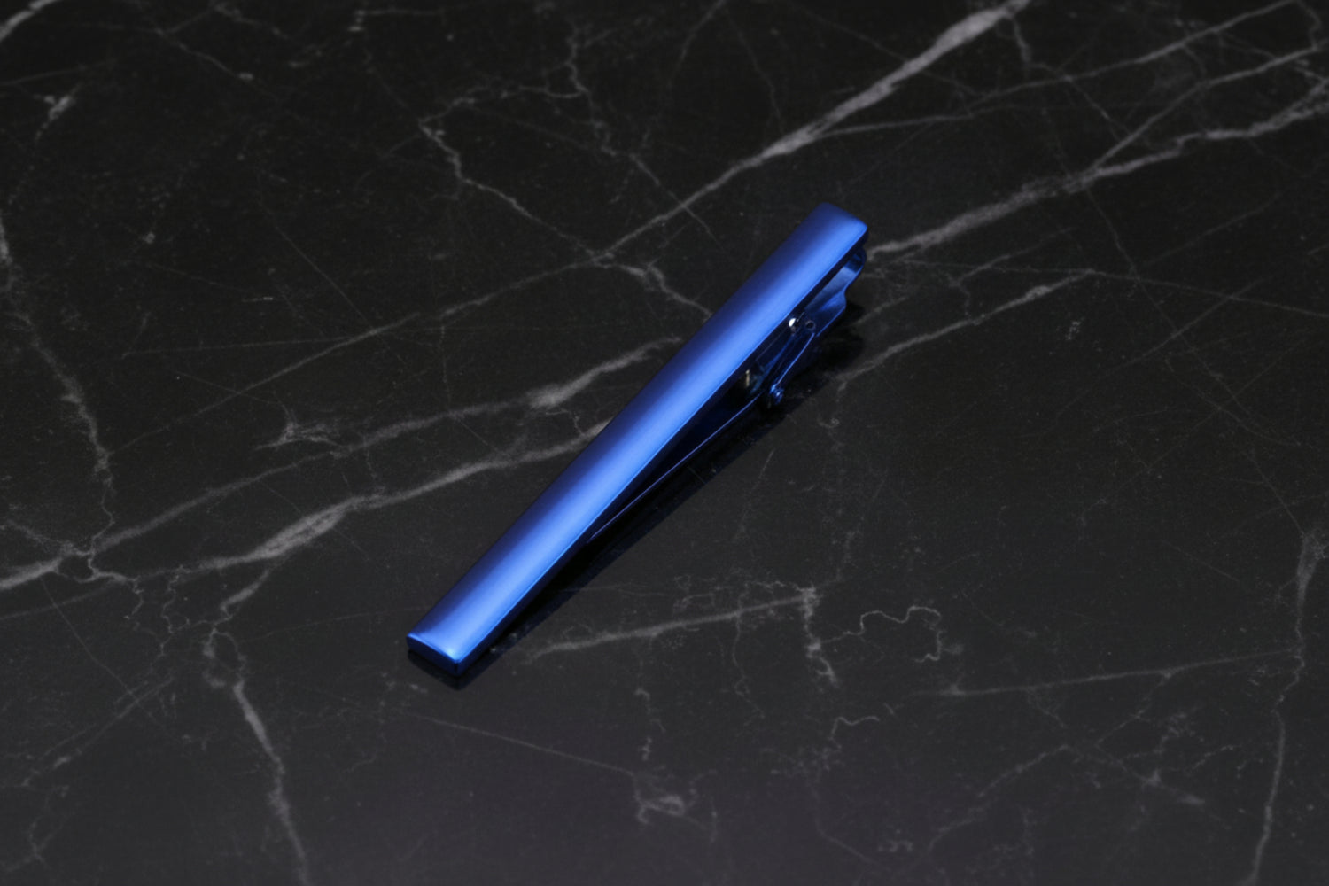 A Solid Blue Colored Tie Bar