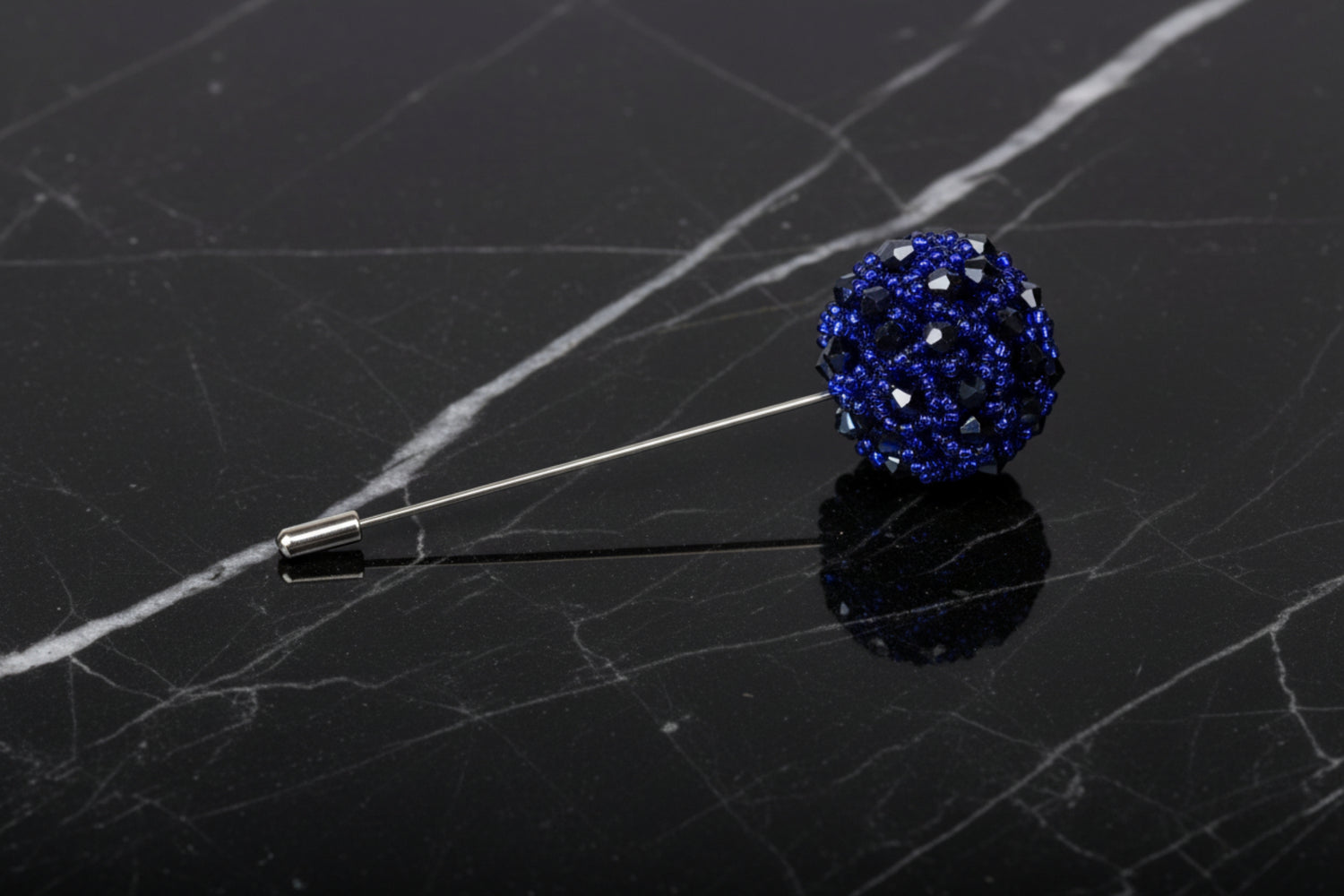 Main View; A Brilliant Blue Colored Stone Lapel Cushion||Brilliant Blue